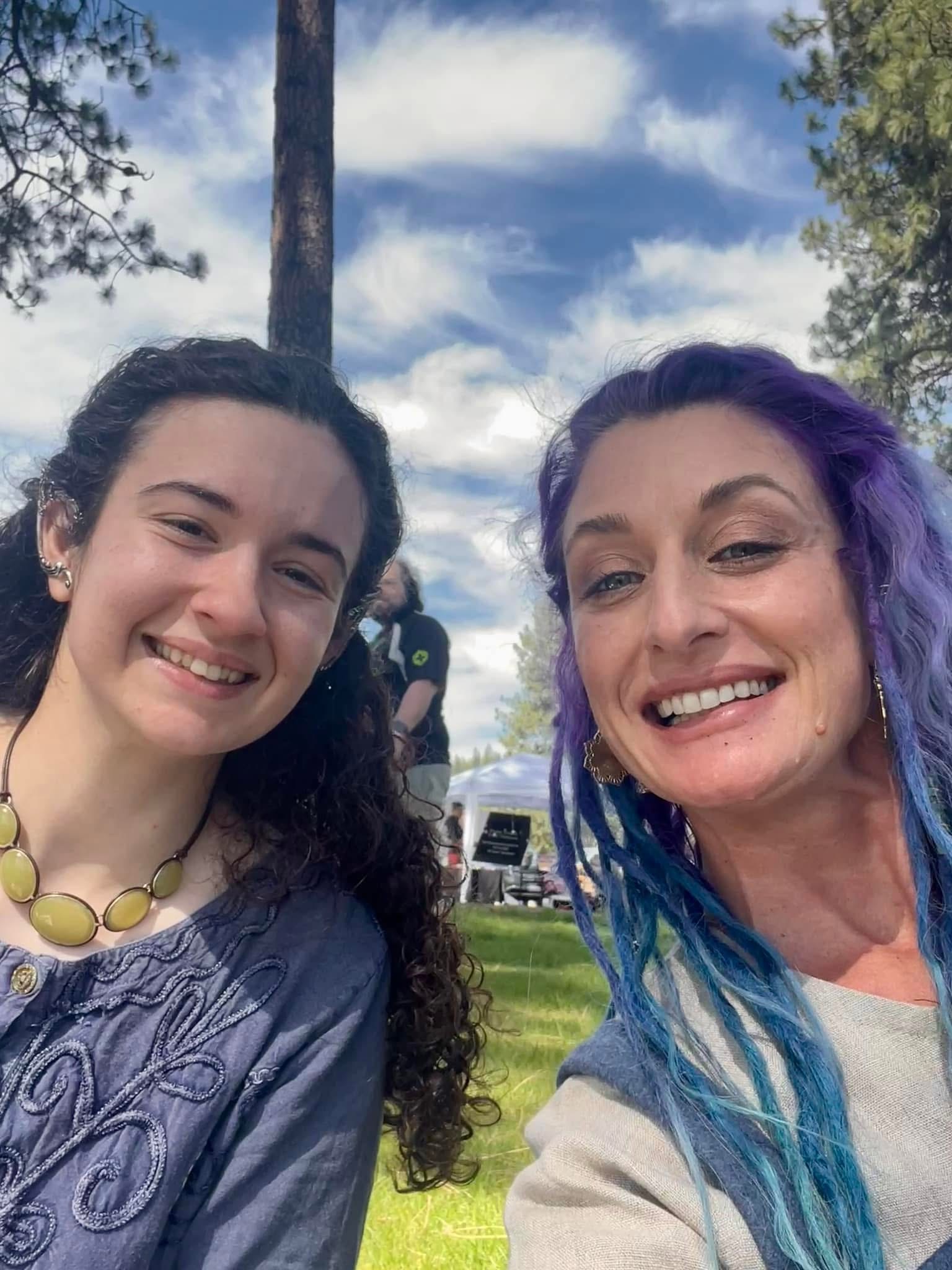 Keisha and Selia smiling together outdoors